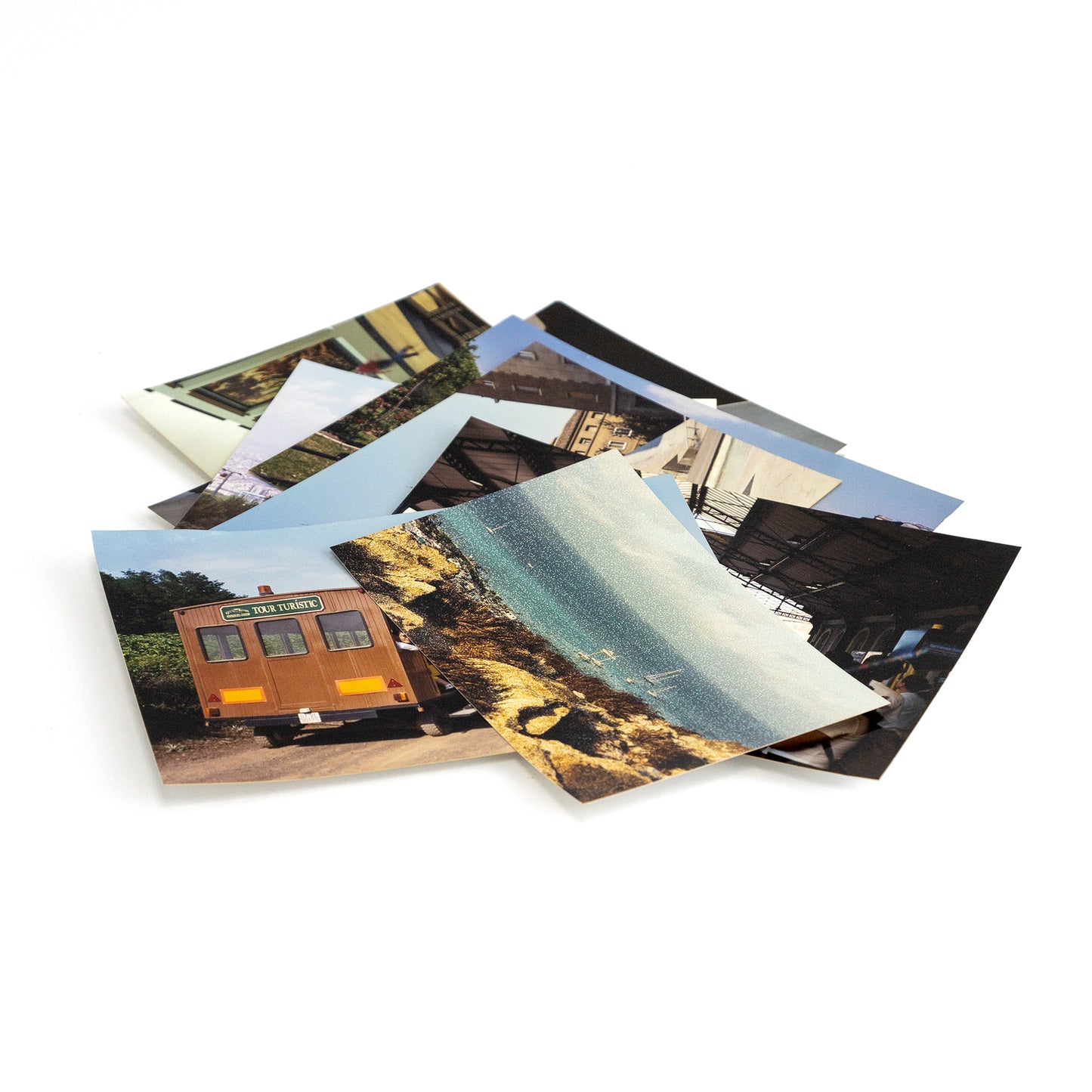 Conjunto de fotografías impresas de paisajes y viajes