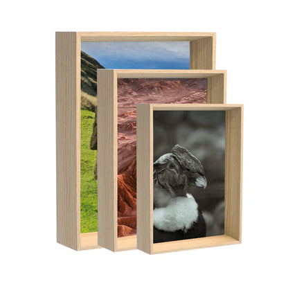 Marco de madera profundo con fotografías