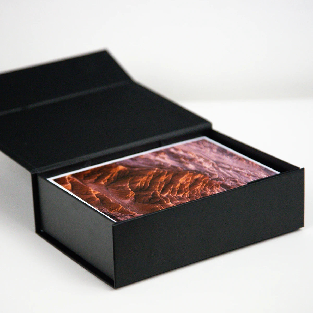 Caja de almacenamiento de fotos 13x18  negra con fotografías